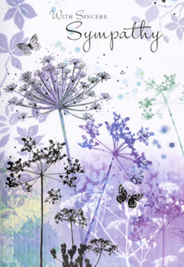 The design of this sympathy card unfolds like a quiet pause in the day, the way Yeading can feel in the still moments between passing traffic and birdsong. Tall, spindly wildflowers with umbrella-like clusters of tiny blossoms rise from an invisible ground, etched in delicate lines of lavender, soft indigo, and pale grey-green. Their stems are slender and slightly curved, suggesting a breeze you cannot see, only sense, as they lean towards one another in a subtle, comforting dance. Around them, the background is washed in blurred veils of violet and powder blue, reminiscent of distant hedgerows and misty skies after a gentle rain. Two butterflies float above the petals, rendered in almost transparent wings with just a hint of colour, like memories that never fully fade. Light in the illustration is soft and even, without any harsh glare, casting a calm glow over every curve and contour. The palette is cool yet tender, calming the gaze and inviting reflection rather than demanding attention. Standing in for spoken words, the card's artwork becomes a visual expression of sympathy you might send alongside a simple, elegant tribute arranged by Florist Yeading for a funeral service or a family home. It captures the way nature holds sorrow with dignity - the wildflowers enduring through the seasons, the butterflies circling back - and turns that quiet resilience into a comforting image. More than just decoration, this card offers a gentle moment of stillness and remembrance, perfect for expressing genuine condolences within the Yeading community.